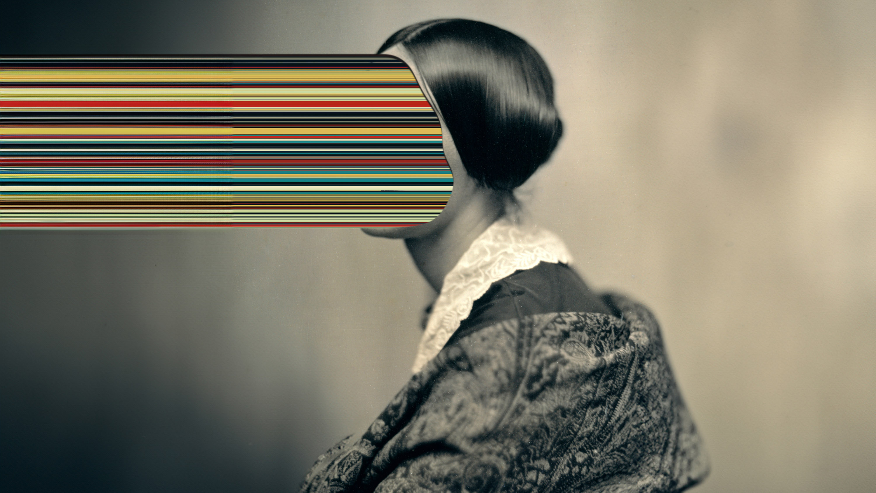 antique photo of a woman with stream of color emitting from where her face would be